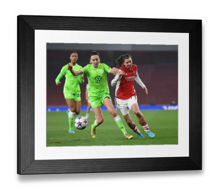 Framed Print : Arsenal vs. VfL Wolfsburg: Tobin Heath and Joelle Wedemeyer Clash in UEFA Women's Champions League Quarterfinals