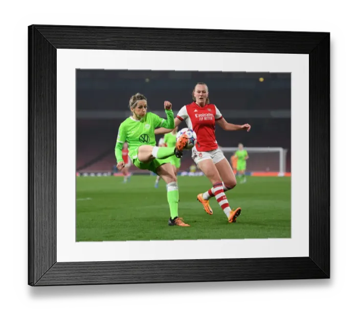 Framed Print : Arsenal vs. VfL Wolfsburg: Frida Maanum Closes In on Kathrin-Julia Hendrich in UEFA Women's Champions League Quarterfinal Framed Print : Arsenal vs. VfL Wolfsburg: Frida Maanum Closes In on Kathrin-Julia Hendrich in UEFA Women's Champions League Quarterfinal