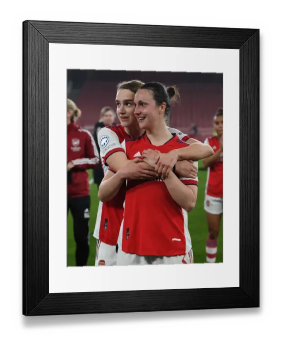 Framed Print : Arsenal Women Celebrate Quarter-Final Victory: Miedema and Wubben-Moy Embrace in Champions League Triumph