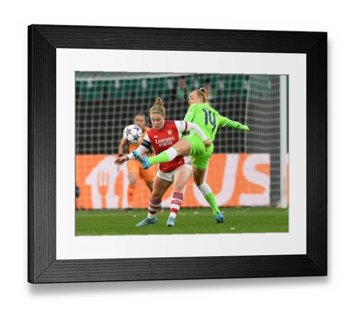 Framed Print : Arsenal vs. VfL Wolfsburg: A Battle in the UEFA Women's Champions League Quarterfinals Framed Print : Arsenal vs. VfL Wolfsburg: A Battle in the UEFA Women's Champions League Quarterfinals