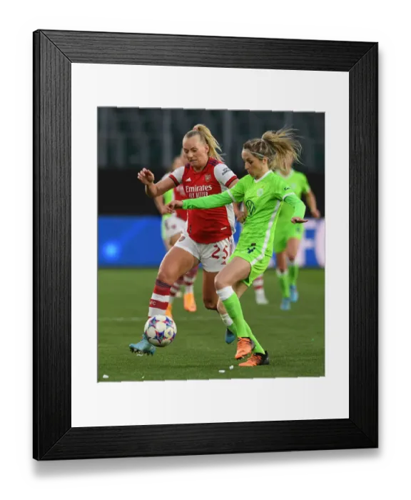 Framed Print : Arsenal vs. VfL Wolfsburg: A Battle in the UEFA Women's Champions League Quarterfinals Framed Print : Arsenal vs. VfL Wolfsburg: A Battle in the UEFA Women's Champions League Quarterfinals