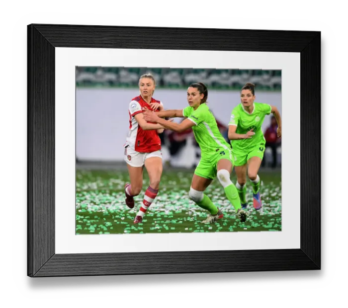 Framed Print : Arsenal vs. VfL Wolfsburg: A Battle in the UEFA Women's Champions League Quarterfinals