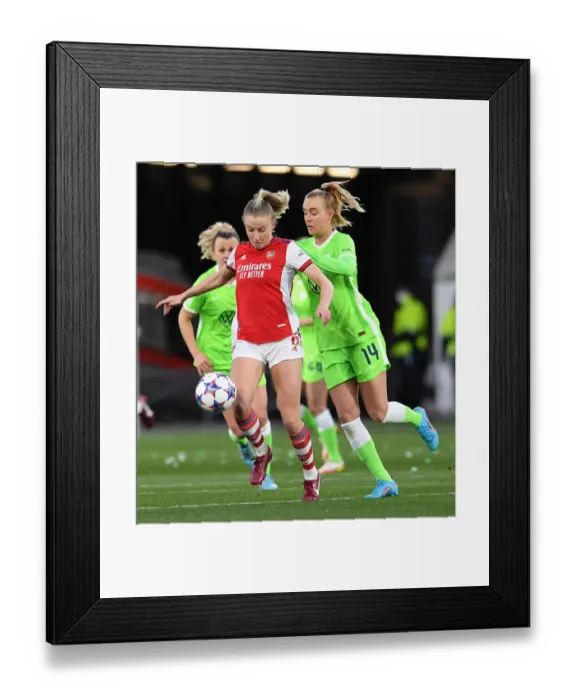 Framed Print : Arsenal vs. VfL Wolfsburg: A Battle in the UEFA Women's Champions League Quarterfinals