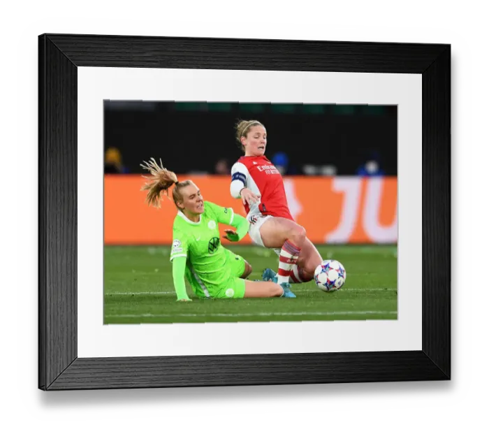 Framed Print : Arsenal vs. VfL Wolfsburg: A Battle in the UEFA Women's Champions League Quarterfinals Framed Print : Arsenal vs. VfL Wolfsburg: A Battle in the UEFA Women's Champions League Quarterfinals