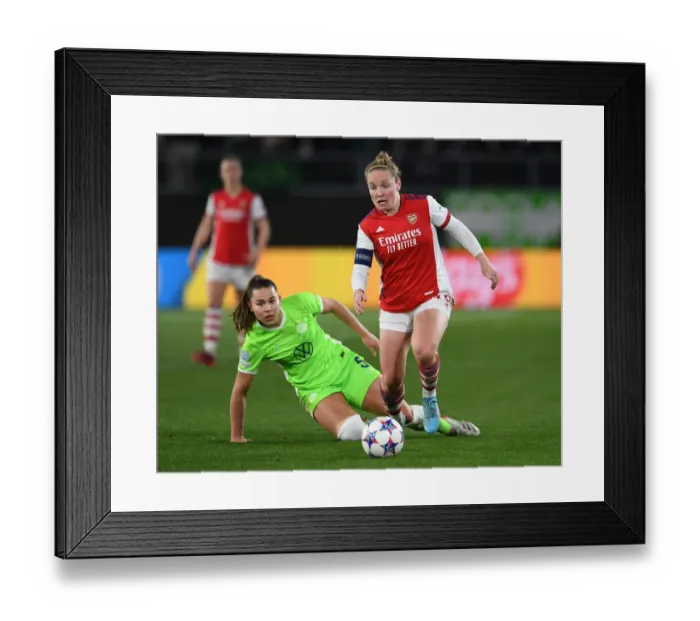 Framed Print : Arsenal vs. VfL Wolfsburg: A Battle in the UEFA Women's Champions League Quarterfinals