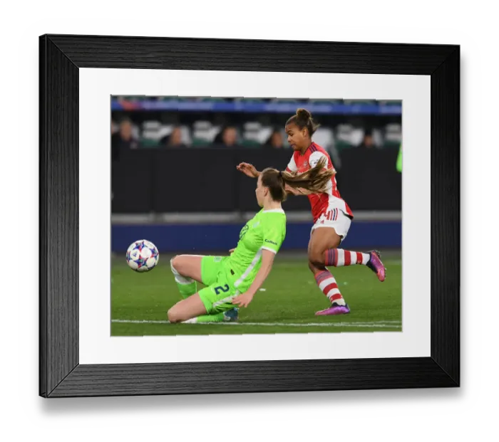 Framed Print : Arsenal vs. VfL Wolfsburg: A Battle in the UEFA Women's Champions League Quarterfinals