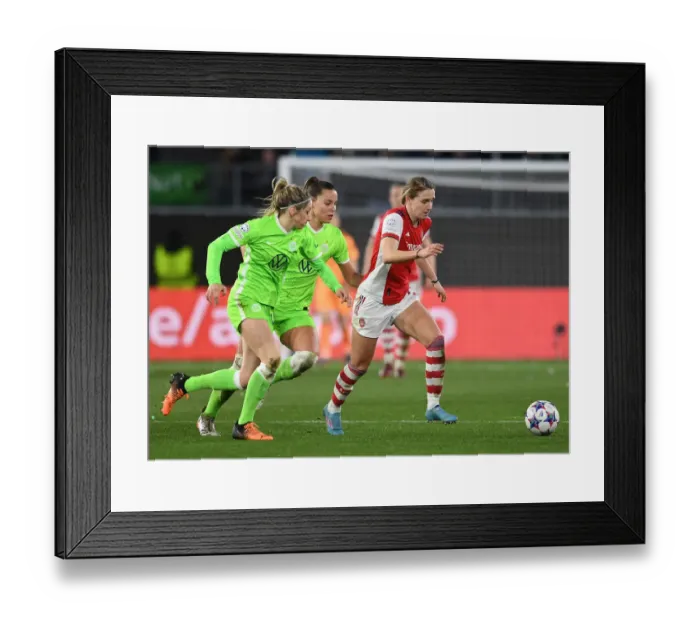Framed Print : Arsenal's Vivianne Miedema Faces Off Against Wolfsburg Defenders in UEFA Women's Champions League Quarterfinals Framed Print : Arsenal's Vivianne Miedema Faces Off Against Wolfsburg Defenders in UEFA Women's Champions League Quarterfinals