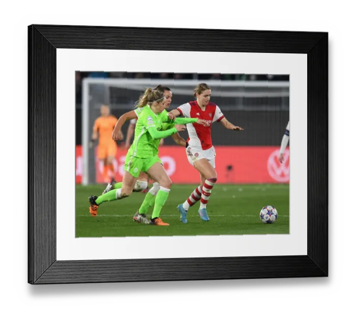 Framed Print : Vivianne Miedema Faces Off Against Wolfsburg Defenders in UEFA Women's Champions League Quarterfinals
