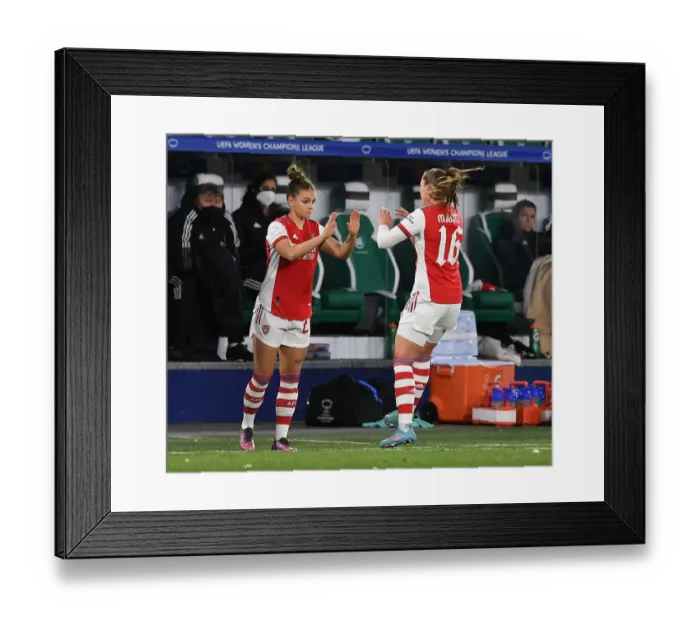 Framed Print : Arsenal Women Face Off Against VfL Wolfsburg in UEFA Champions League Quarterfinals