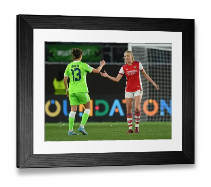 Framed Print : Sportsmanship Triumph: Leah Williamson and Felicitas Rauch's Heartwarming Handshake after Arsenal's Champions League Victory