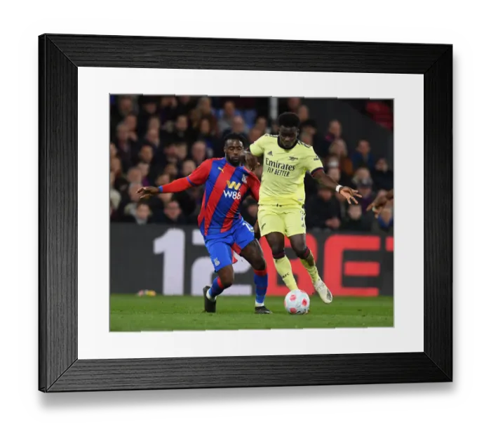 Framed Print : Saka Slices Through Crystal Palace: Arsenal's Bukayo Shines in London Derby