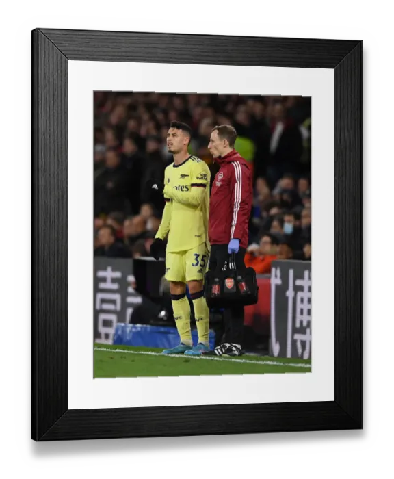 Framed Print : Arsenal's Ricky O'Donoghue Tends to Injured Gabriel Martinelli vs Crystal Palace (April 2022) Framed Print : Arsenal's Ricky O'Donoghue Tends to Injured Gabriel Martinelli vs Crystal Palace (April 2022)