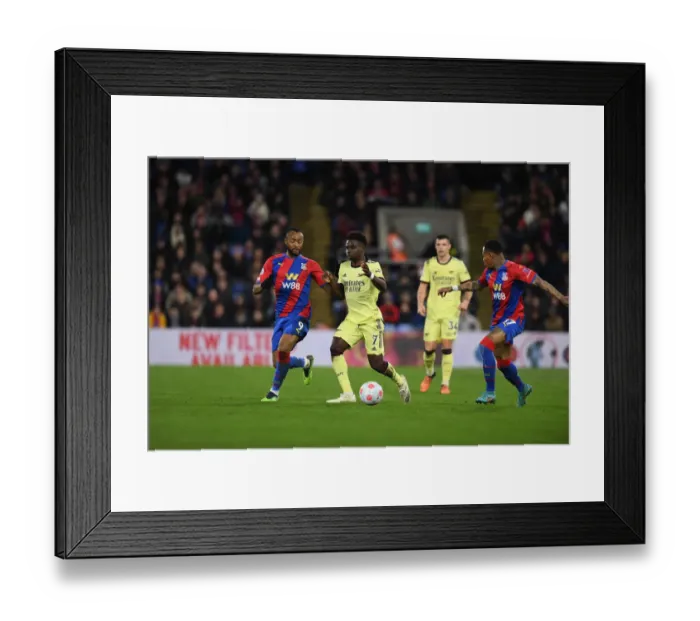 Framed Print : Arsenal's Ricky O'Donoghue Tends to Injured Gabriel Martinelli during Crystal Palace vs Arsenal (2021-22)