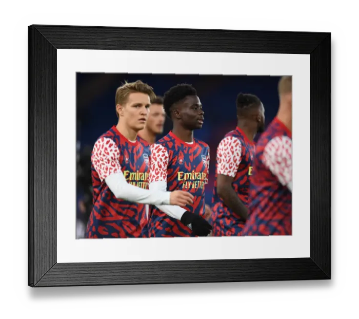 Framed Print : Arsenal's Bid for Victory: Saka Warms Up Ahead of Crystal Palace Clash (Premier League, April 2022)