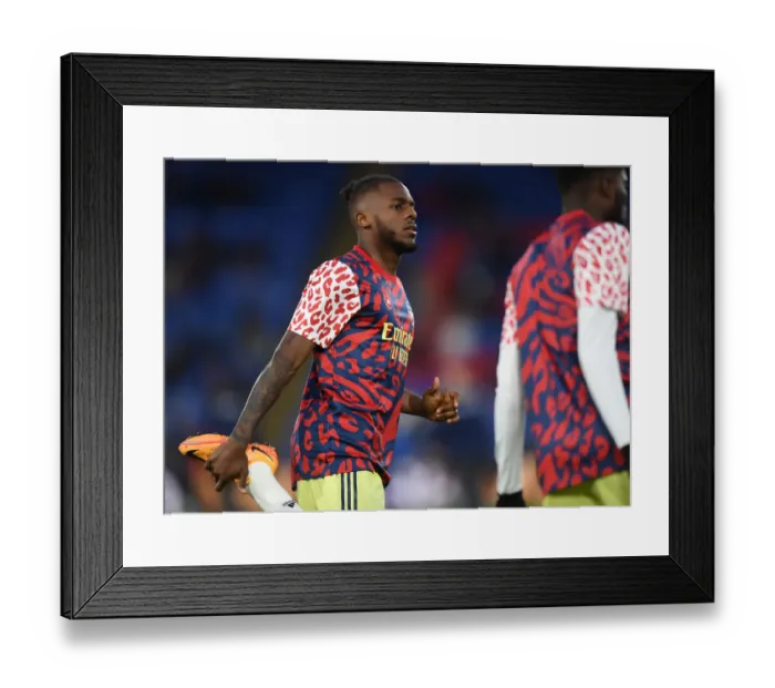 Framed Print : Arsenal's Nuno Tavares Warming Up Ahead of Crystal Palace Clash - Premier League 2021-22