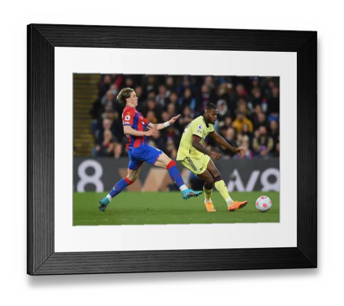 Framed Print : Clash at Selhurst Park: Nuno Tavares vs Conor Gallagher in the Premier League Battle between Crystal Palace and Arsenal Framed Print : Clash at Selhurst Park: Nuno Tavares vs Conor Gallagher in the Premier League Battle between Crystal Palace and Arsenal