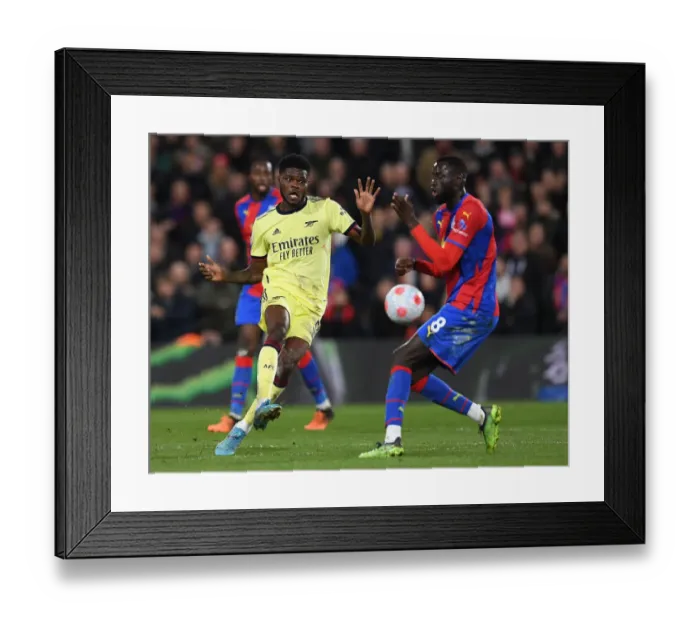 Framed Print : Thomas Partey Faces Pressure from Cheikhou Kouyate in Crystal Palace vs Arsenal Premier League Clash Framed Print : Thomas Partey Faces Pressure from Cheikhou Kouyate in Crystal Palace vs Arsenal Premier League Clash