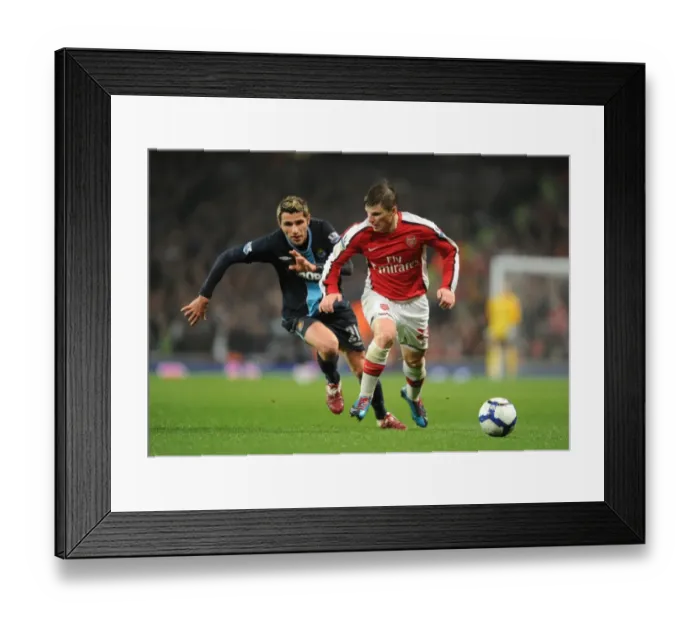 Framed Print : Andrey Arshavin (Arsenal) Valon Behrami (West Ham). Arsenal 2: 0 West Ham United