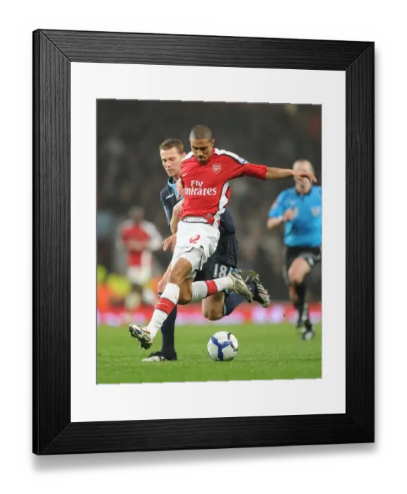 Framed Print : Gael Clichy (Arsenal) Jonathan Spector (West Ham). Arsenal 2: 0 West Ham United