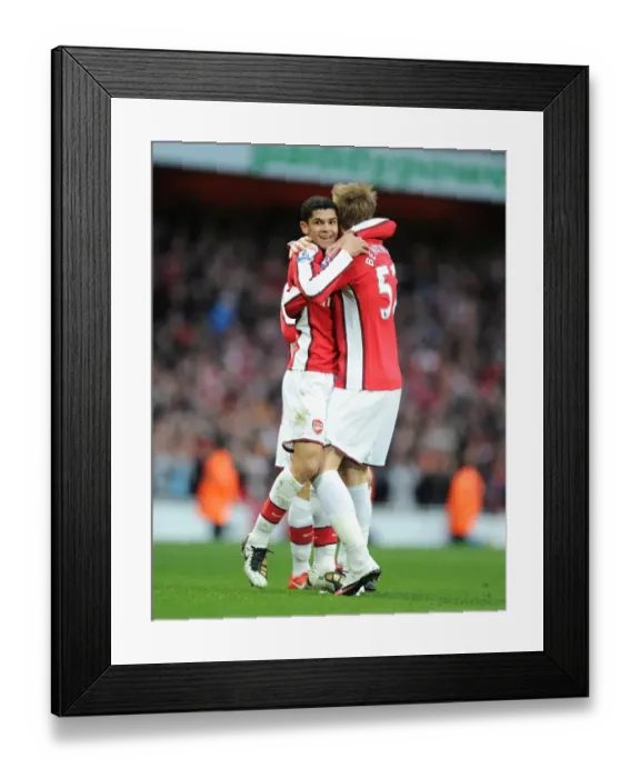 Framed Print : Denilson and Bendtner: Arsenal's Unforgettable Goal Celebration vs. West Ham United (2010) Framed Print : Denilson and Bendtner: Arsenal's Unforgettable Goal Celebration vs. West Ham United (2010)
