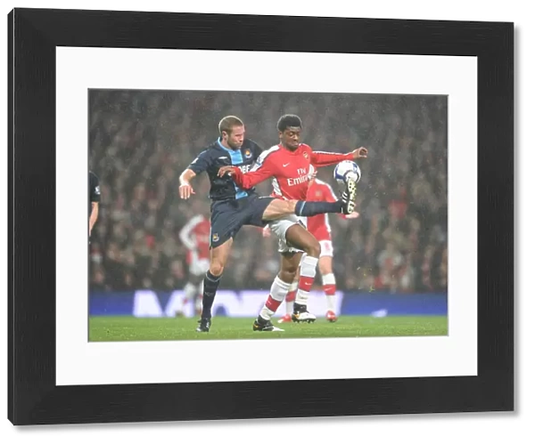 Abou Diaby (Arsenal) Matthew Upson (West Ham). Arsenal 2: 0 West Ham United