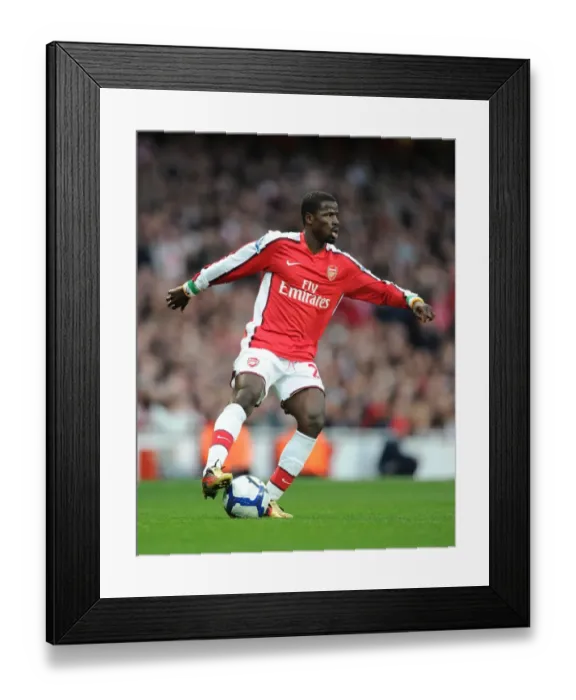Framed Print : Arsenal's Emmanuel Eboue Celebrates Goal Against West Ham United in Premier League Match at Emirates Stadium (2010)