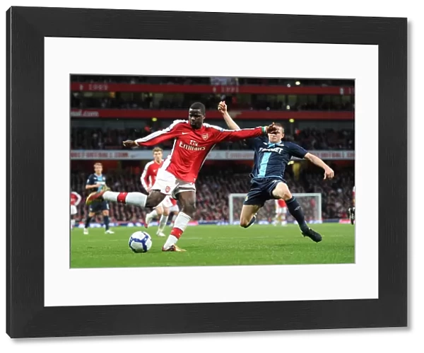 Emmanuel Eboue (Arsenal) Fabio Daprela (West Ham). Arsenal 2: 0 West Ham United