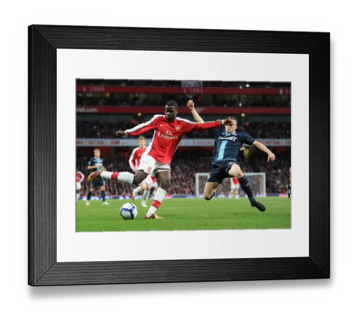 Framed Print : Emmanuel Eboue (Arsenal) Fabio Daprela (West Ham). Arsenal 2: 0 West Ham United