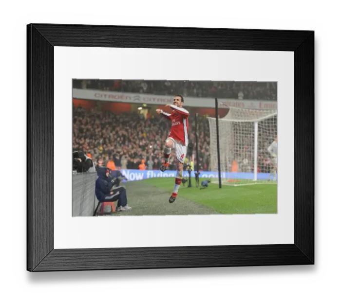 Framed Print : Arsenal Soars Ahead: Cesc Fabregas's Strike Gives Arsenal a 2-0 Lead Against West Ham United Framed Print : Arsenal Soars Ahead: Cesc Fabregas's Strike Gives Arsenal a 2-0 Lead Against West Ham United