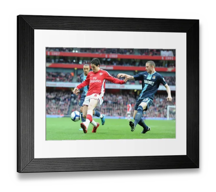 Framed Print : Samir Nasri (Arsenal) Fabio Daprela (West Ham). Arsenal 2: 0 West Ham United Framed Print : Samir Nasri (Arsenal) Fabio Daprela (West Ham). Arsenal 2: 0 West Ham United