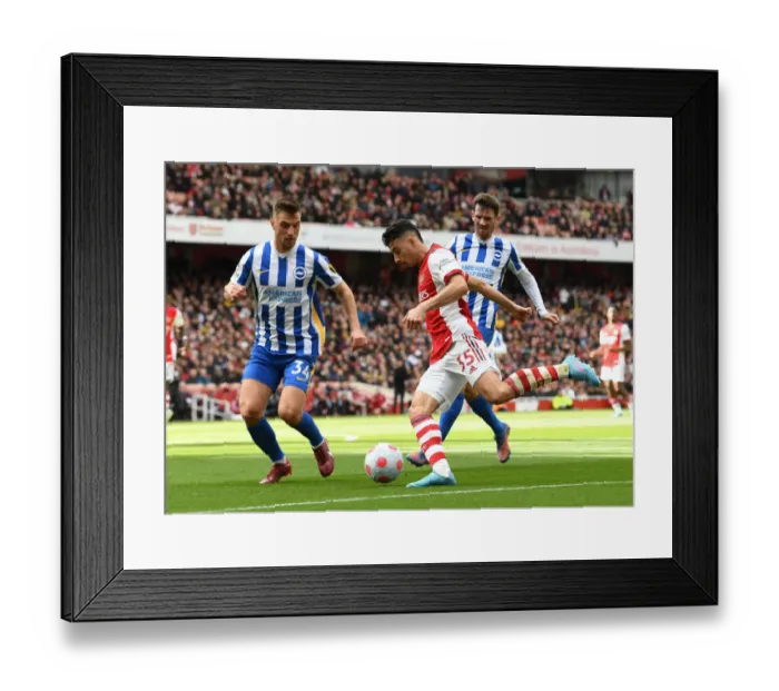 Framed Print : Arsenal's Martinelli Clashes with Brighton's Veltman and Gross: Intense Battle in the Premier League (April 2022)