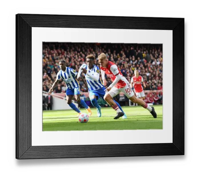 Framed Print : Smith Rowe vs Bissouma: A Premier League Showdown - Arsenal vs Brighton (April 2022)