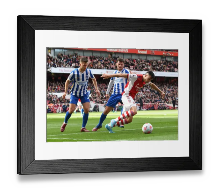 Framed Print : Martinelli vs. Brighton: A Premier League Battle at Arsenal's Emirates Stadium