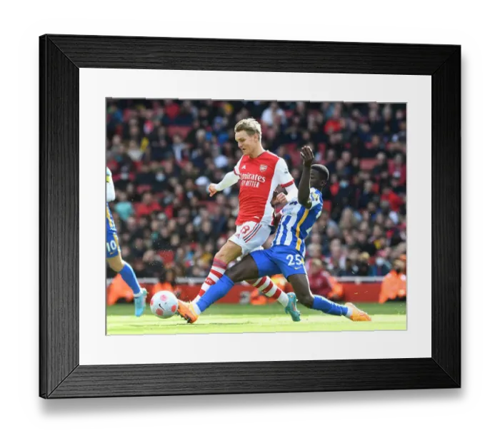 Framed Print : Odegaard vs Caicedo: Intense Rivalry Unfolds - Arsenal vs Brighton Premier League Showdown (2021-22)