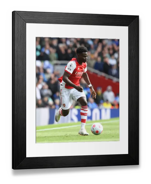 Framed Print : Bukayo Saka in Action: Arsenal vs Brighton & Hove Albion, Premier League 2021-22