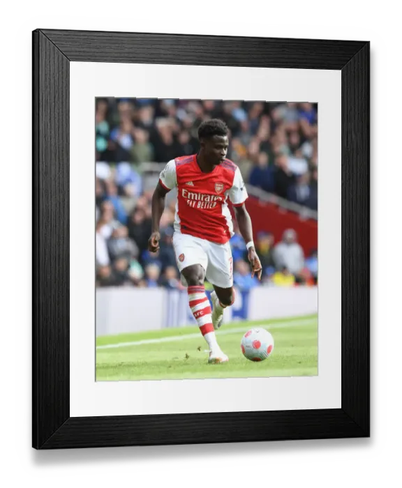Framed Print : Arsenal's Bukayo Saka in Action: Premier League Clash Against Brighton & Hove Albion, 2021-22