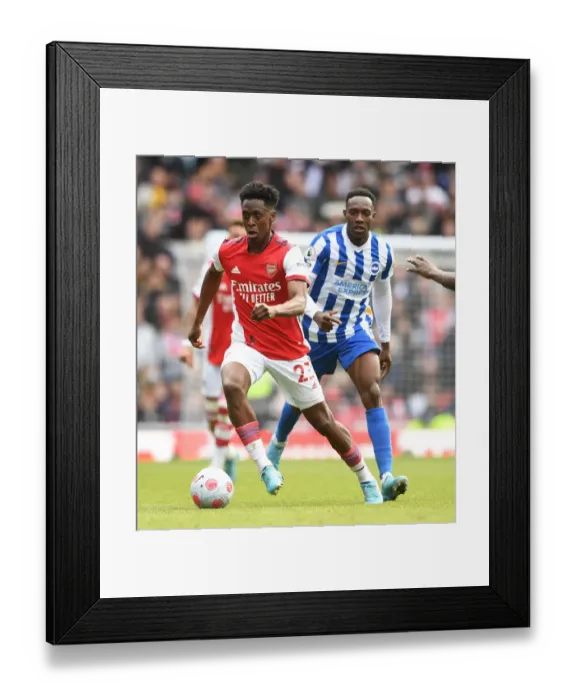 Framed Print : Intense Clash: Lokonga vs. Welbeck at the Emirates - Arsenal vs. Brighton (2021-22)
