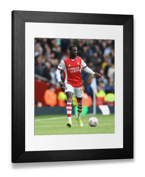 Framed Print : Arsenal's Nicolas Pepe in Action: Premier League 2021-22 - Arsenal vs Brighton & Hove Albion Framed Print : Arsenal's Nicolas Pepe in Action: Premier League 2021-22 - Arsenal vs Brighton & Hove Albion