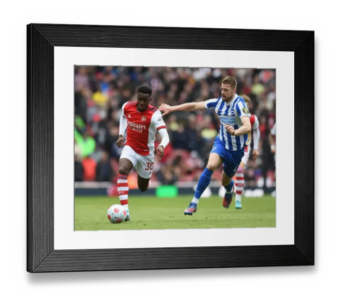 Framed Print : Arsenal vs. Brighton: Nketiah vs. Webster Battle in Premier League Showdown