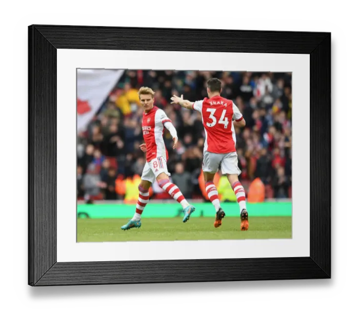 Framed Print : Martin Odegaard's Goal: Arsenal Secures Victory Against Brighton & Hove Albion (April 2022)