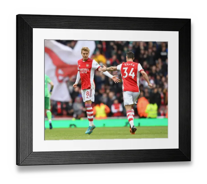 Framed Print : Martin Odegaard Scores: Arsenal Defeats Brighton & Hove Albion in Premier League