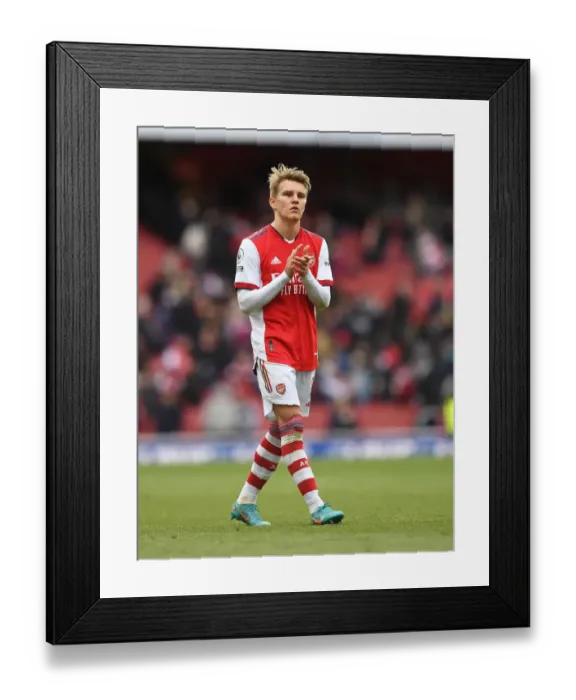 Framed Print : Arsenal Celebrate Victory Over Brighton: Martin Odegaard Rallies Fans
