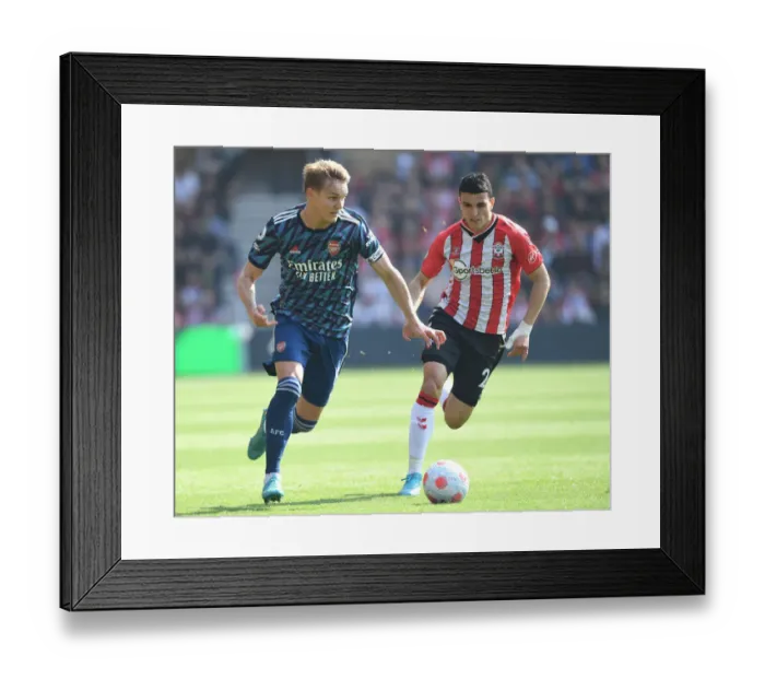 Framed Print : Martin Odegaard Breaks Past Mohamed Elyounoussi: Southampton vs Arsenal, Premier League 2021-22 Framed Print : Martin Odegaard Breaks Past Mohamed Elyounoussi: Southampton vs Arsenal, Premier League 2021-22