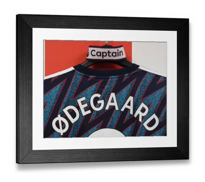Framed Print : Martin Odegaard: Arsenal Captain Gears Up for Southampton Showdown in the Changing Room