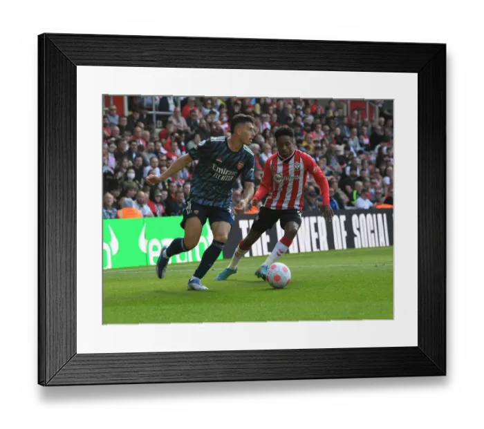 Framed Print : Martinelli vs Walker-Peters: Intense Battle in Southampton v Arsenal Premier League Clash Framed Print : Martinelli vs Walker-Peters: Intense Battle in Southampton v Arsenal Premier League Clash