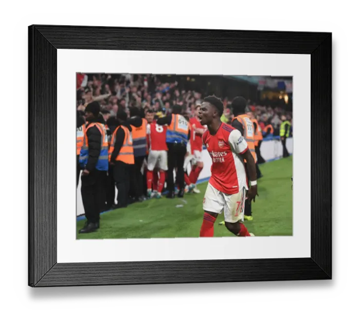 Framed Print : Saka Scores Spectacularly: Arsenal's Fourth Goal vs. Chelsea, Premier League 2021-22