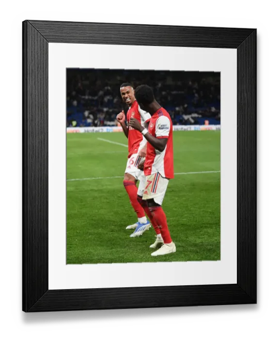 Framed Print : Arsenal's Four-Goal Blitz: Saka and Gabriel's Euphoric Moment at Stamford Bridge (April 2022)