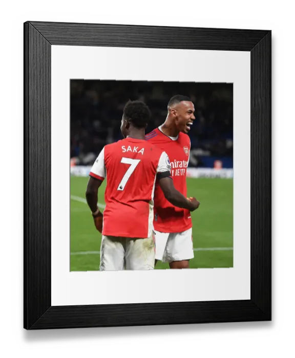 Framed Print : Arsenal's Four-Goal Blitz: Saka and Gabriel's Euphoric Moment at Stamford Bridge (April 2022)