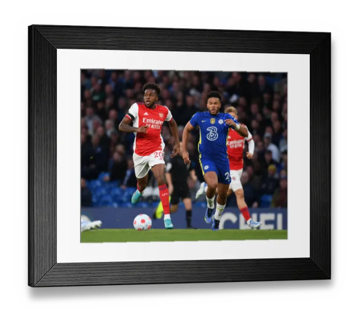 Framed Print : Nuno Tavares Outsmarts Reece James: A Premier League Showdown at Stamford Bridge, 2021-22