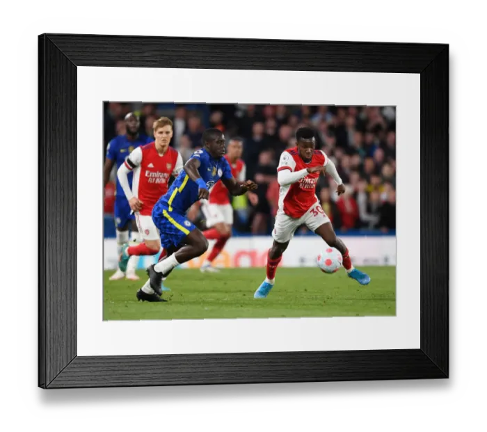 Framed Print : Nketiah Outwits Sarr: Thrilling Moment from the Intense Chelsea vs. Arsenal Clash